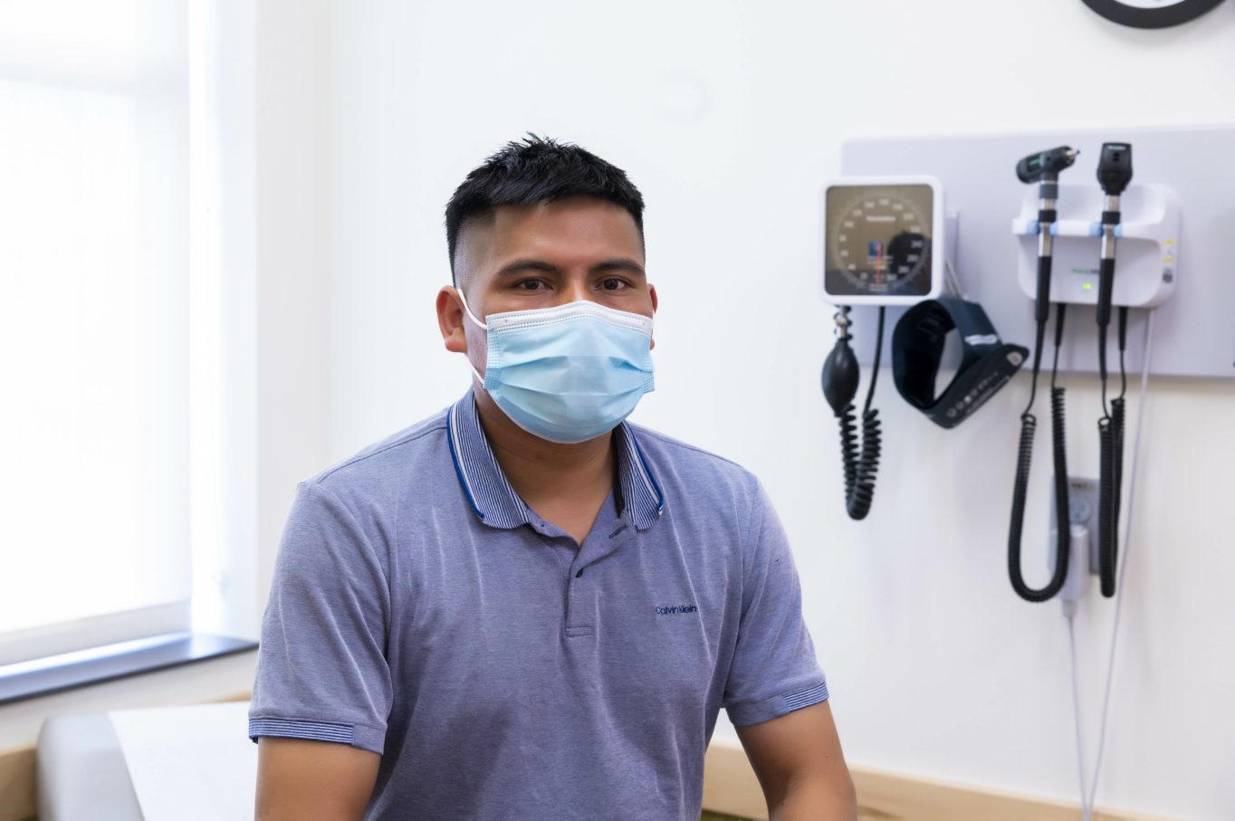 Hugo, OneWorld patient, wearing a face mask.