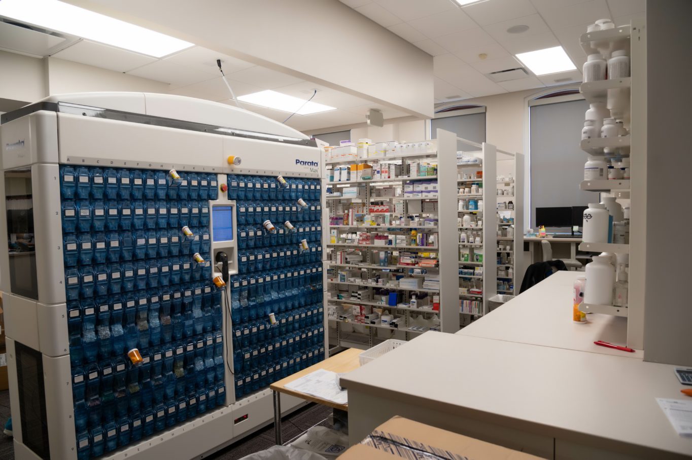 A room with shelves of medicine