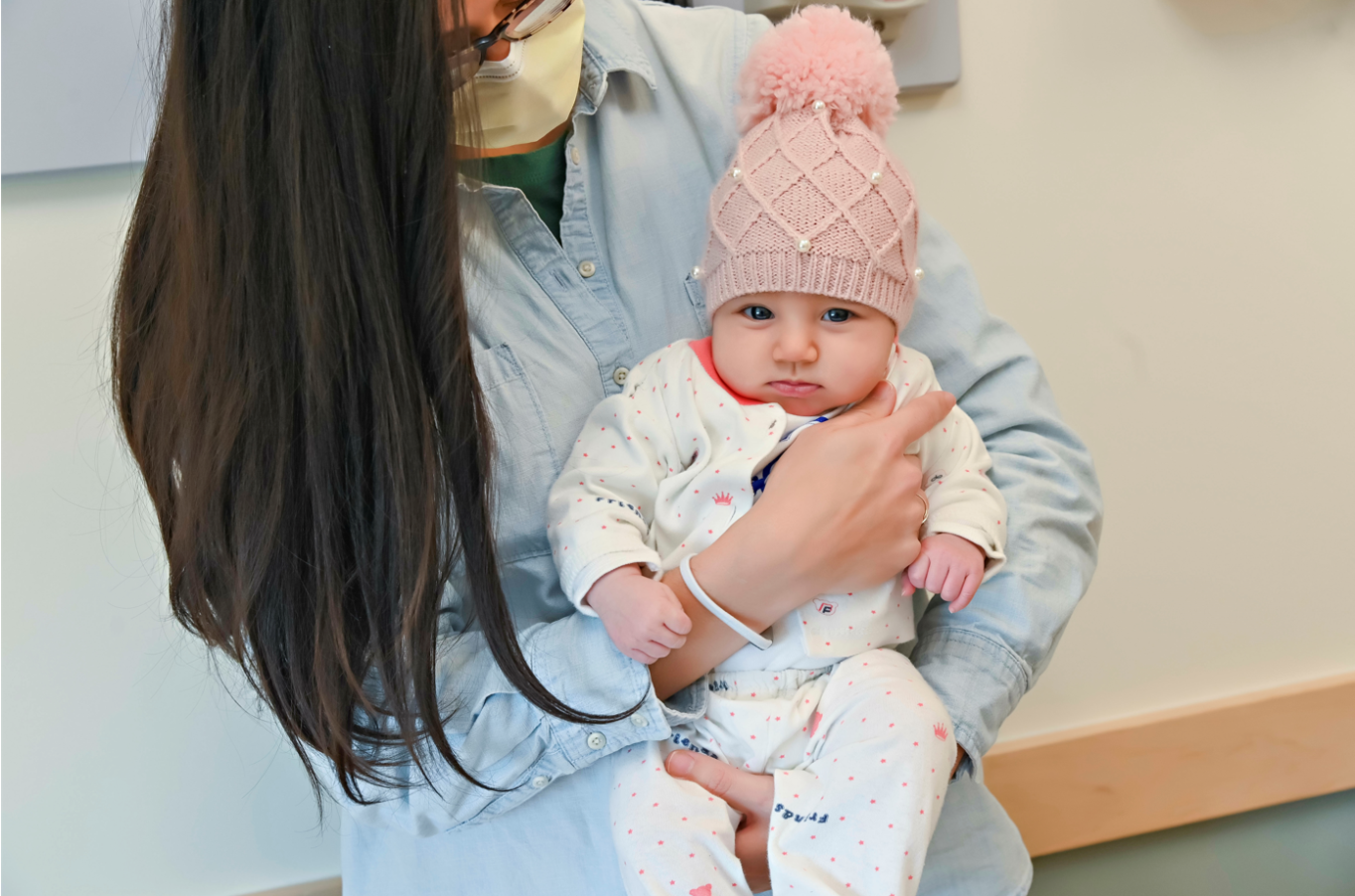 A person holding a baby 